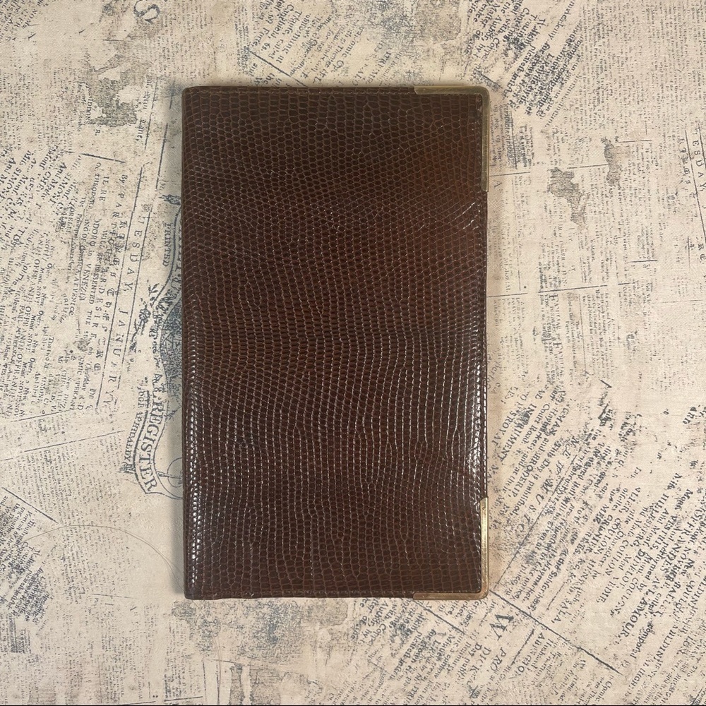 Smythson Antique lizard skin passport wallet with gold corners